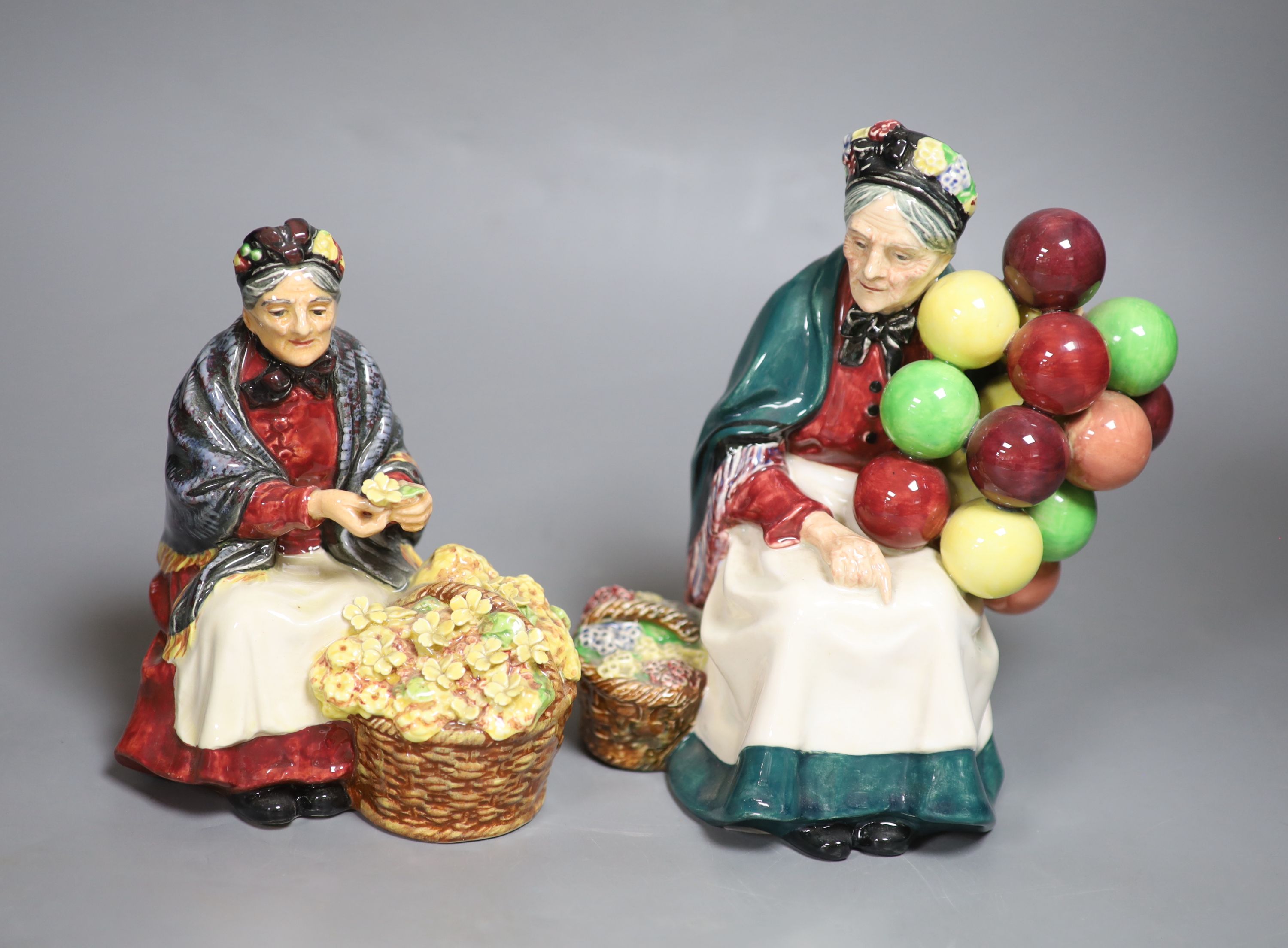 Two Royal Doulton figures: The old balloon seller HN1315, Primroses HN1617